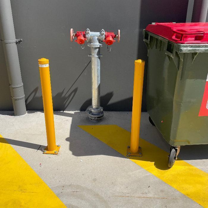 Fire hydrant protection with bollards