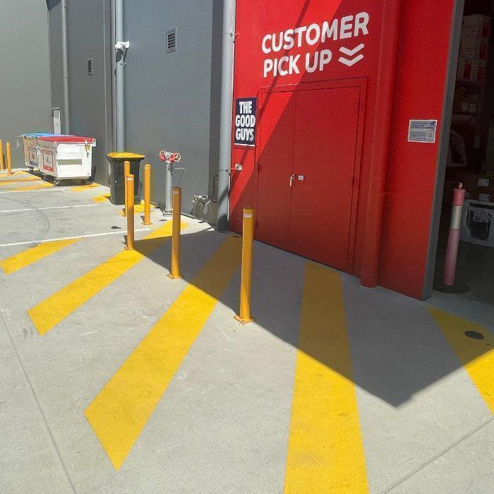 Bollards protecting door access ways